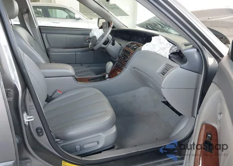 2003 Toyota Avalon Xls z USA, uszkodzony, nr VIN 4T1BF28B93U335758